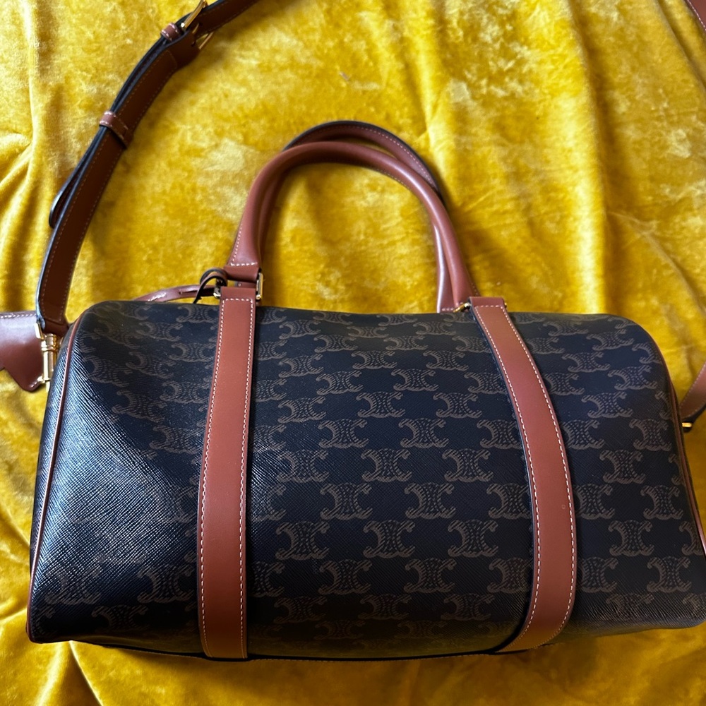 MEDIUM TRAVEL BAG IN TRIOMPHE CANVAS AND CALFSKIN - Picture 5 of 16